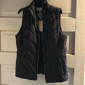 Michael Kors Black quilted vest.Size S.New .